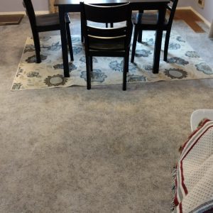 Carpet before wood flooring Port;and