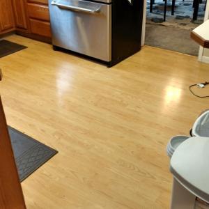 Old laminate flooring replaced with beautiful hardwood floors